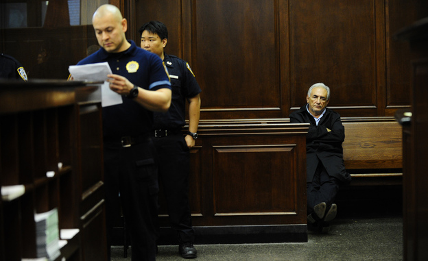 IMF chief Dominique Strauss-Kahn, waits be arraigned on sexual assault charges at Manhattan Criminal Court in New York, on Monday, May 16, 2011.