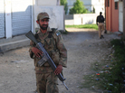 Pakistani military and police officials cordoned off a street in Abbottabad near the compound where Osama Bin Laden was found and killed. (May 8, 2011, file photo.) Pakistani military and police officials cordoned off a street in Abbottabad near the compound where Osama Bin Laden was found and killed. (May 8, 2011, file photo.)