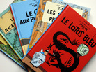 Several cartoon books featuring legend reporter Tintin, created by Belgian author Georges Remi aka Herge, are seen on October 24, 2010 in Bordeaux. Several cartoon books featuring legend reporter Tintin, created by Belgian author Georges Remi aka Herge, are seen on October 24, 2010 in Bordeaux.
