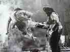Vic Armstrong performed stunts for Harrison Ford, as Indiana Jones. Here he fights Pat Roach's goliath Indian guard. Vic Armstrong performed stunts for Harrison Ford, as Indiana Jones. Here he fights Pat Roach's goliath Indian guard.