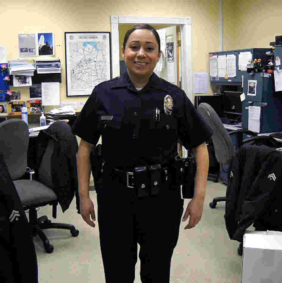 "I wear the same badge and have the same gun, same uniform," says Arcelia Ponce, who has been working as a volunteer in the Los Angeles Police Department's reserves for two years.
