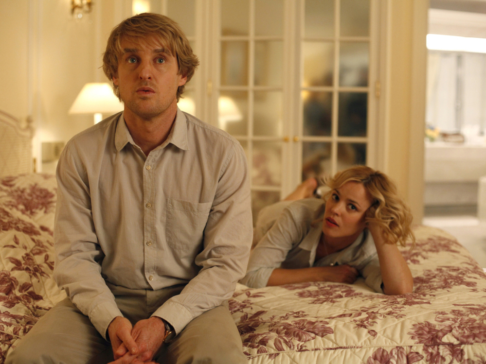 Owen Wilson, playing the time-traveling hero Gil, wants to write novels instead of movies, much to the horror of his fiancee Inez, played by Rachel McAdams. Owen Wilson, playing the time-traveling hero Gil, wants to write novels instead of movies, much to the horror of his fiancee Inez, played by Rachel McAdams.