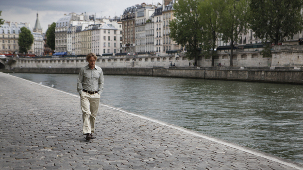 Owen Wilson plays Gil, a Hollywood screenwriter on vacation in Paris who wishes he could escape back to the 1920s. David Edelstein says his performance is one of the finest by a lead in a Woody Allen film — and rivals many of Allen's performances, too.