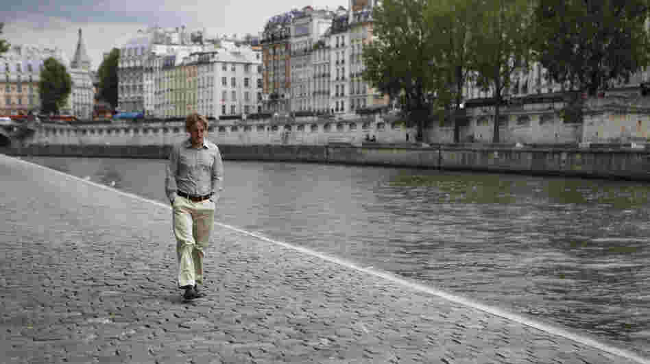 Owen Wilson plays Gil, a Hollywood screenwriter on vacation in Paris who wishes he could escape back to the 1920s. David Edelstein says his performance is one of the finest by a lead in a Woody Allen film — and rivals many of Allen's performances, too.