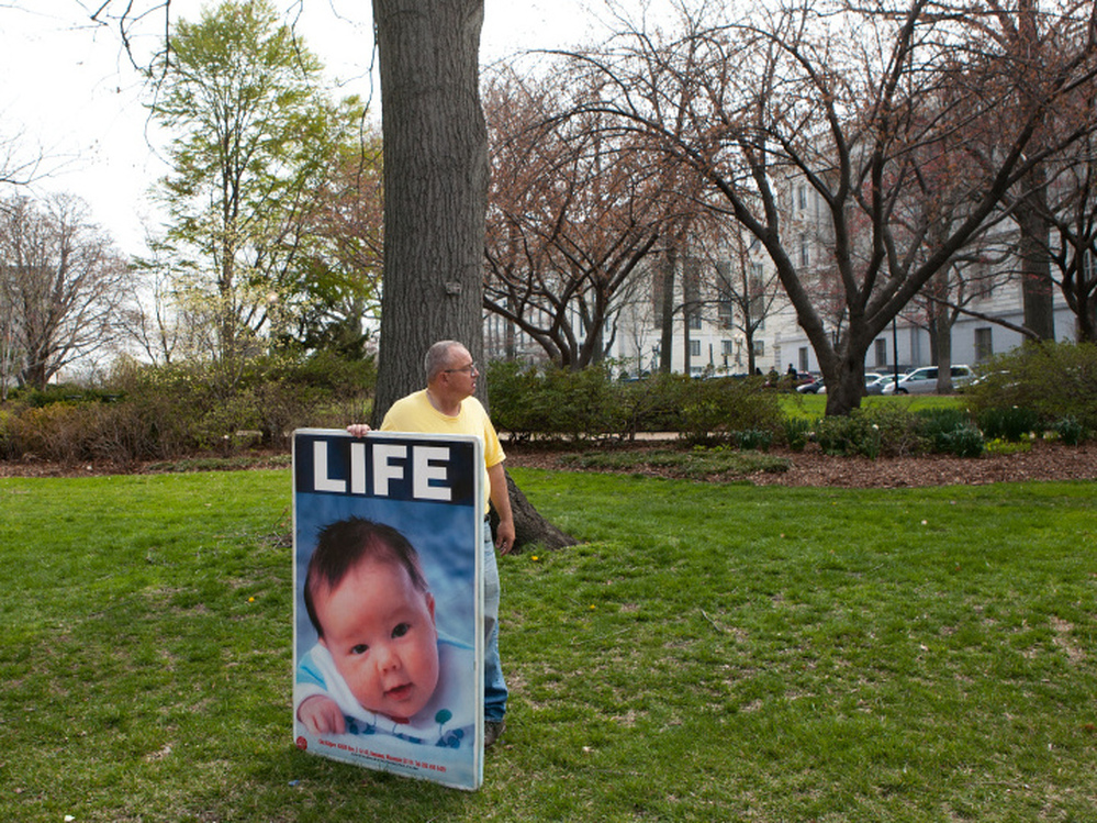Stewart Schwartz of Laurel, Md., attends a rally opposing federal funding for Planned Parenthood on Capitol Hill on April 7, 2011.