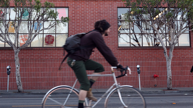A bicyclist on the move in San Francisco.