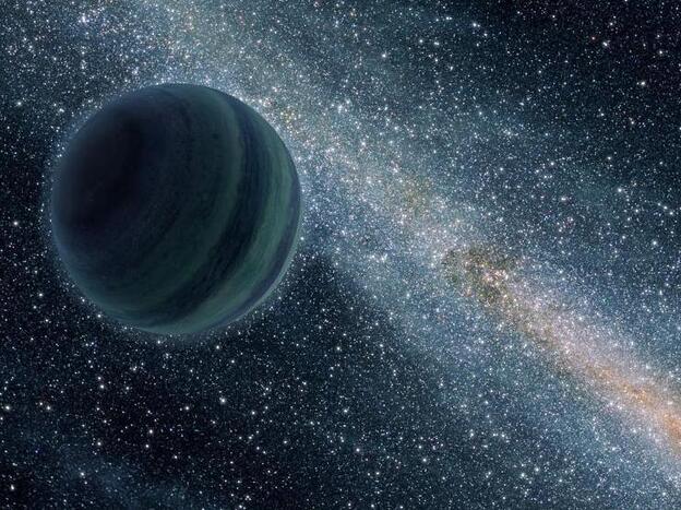 This artist's illustration of a Jupiter-like planet alone in the  dark of space, floating freely without a parent star. Astronomers think there may be 10 such lone worlds.
