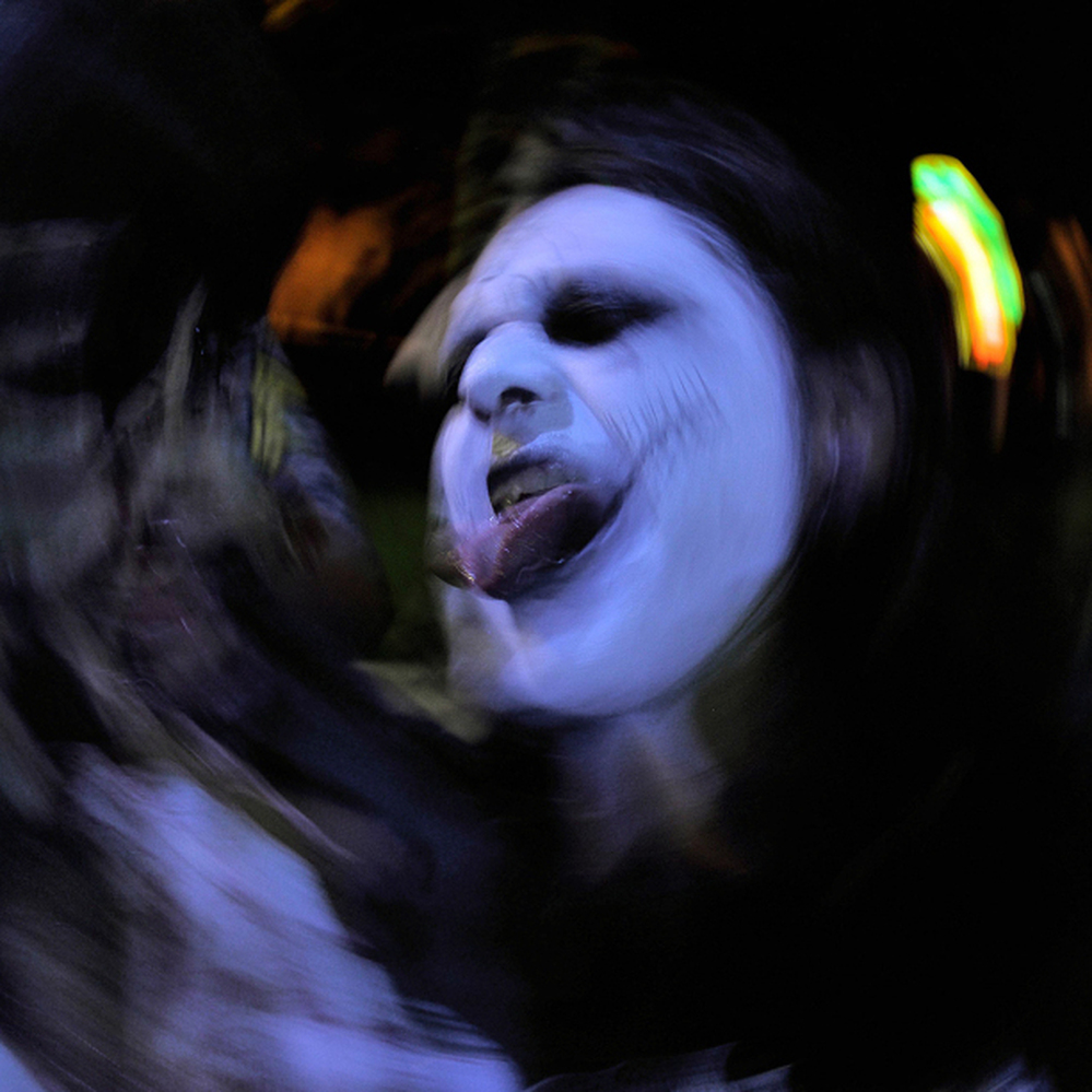 We're researchers. May we ask you a few questions? (A "zombie" photographed on Oct. 31, 2010, in San Jose, Costa Rica.)