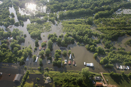 Floodwaters inundate homes in Vicksburg, Miss., on Wednesday. Floodwaters inundate homes in Vicksburg, Miss., on Wednesday.