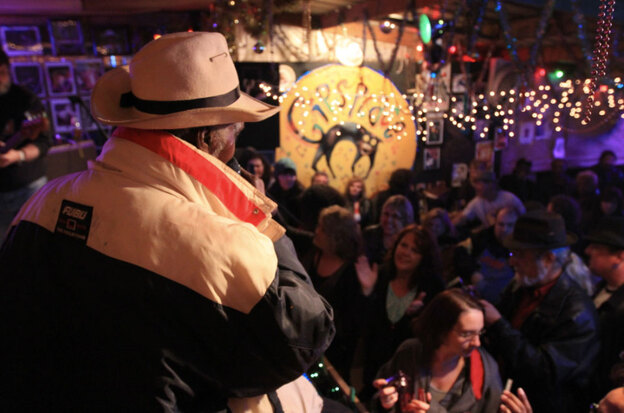 Owner Henry Gipson (aka Mr. Gip) addresses the crowd at Gip's Place in Bessemer, Ala.