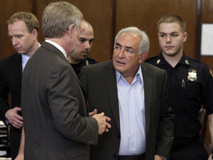 Former International Monetary Fund leader Dominique Strauss-Kahn (center) talks with his attorney William Taylor (left) as he leaves court court after his bail hearing in New York state Supreme Court, Thursday, May 19, 2011. Former International Monetary Fund leader Dominique Strauss-Kahn (center) talks with his attorney William Taylor (left) as he leaves court court after his bail hearing in New York state Supreme Court, Thursday, May 19, 2011.