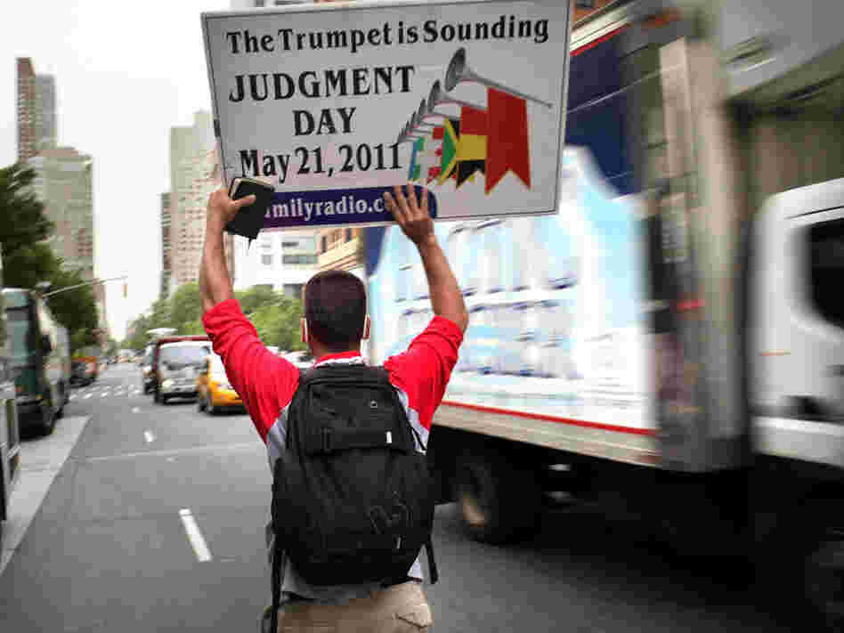 May 13:  A believer walks through the streets of Manhattan.