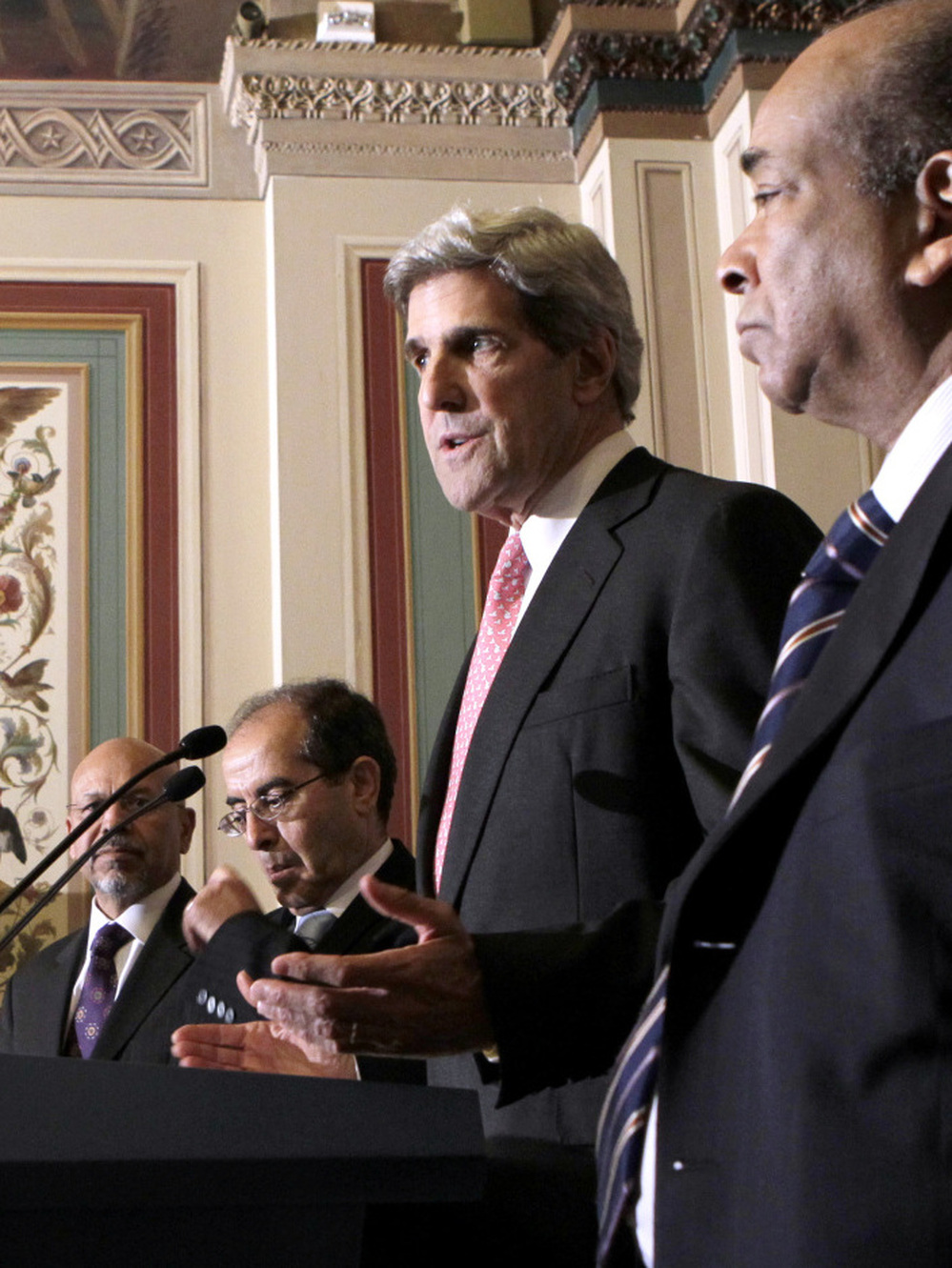 Senate Foreign Relations Committee Chairman John Kerry (D-MA, second from right) discusses his meeting with a Libyan delegation opposed to the regime of Moammar Gadhafi on May 11. From left: former Libyan ambassador to the U.S. Ali Suleiman Aujali; Mahmoud Jibril,  with the Libyan Transitional National Council; and former Libyan ambassador to the U.N. Abdurrahman Mohamed Shalgham.