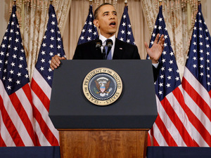 President Obama delivers a speech on Mideast and North Africa policy at the State Department on Thursday. The president says economic reform will be crucial to the spread of democracy throughout the region. President Obama delivers a speech on Mideast and North Africa policy at the State Department on Thursday. The president says economic reform will be crucial to the spread of democracy throughout the region.