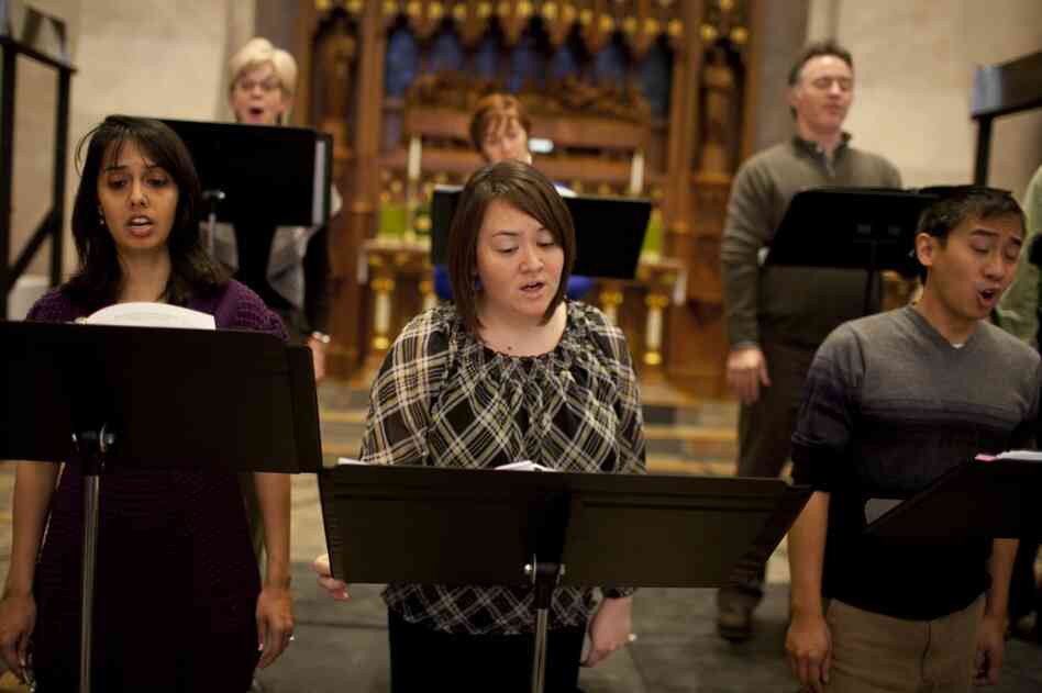 Members of Conspirare rehearse. The pieces they perform include works by Renaissance composers Josquin Des Prez, Orlandus Lassus, Tomás Luis de Victoria, and J.S. Bach, as well as a modern musical response by Kyr.