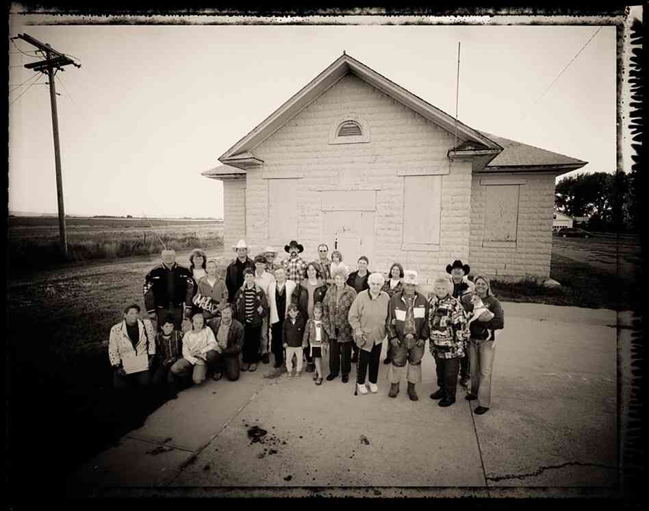 "Driving through nowhere, Wyoming, we came upon the town of Emblem with a population of 10. It seemed like an inspired idea to do a portrait of an entire town. ... We made little fliers and she put them in all the P.O. boxes. We set up a barbecue at the community center. There are more than 10 people in the picture; they cheated. People came in from outlying areas because they all wanted to be ...