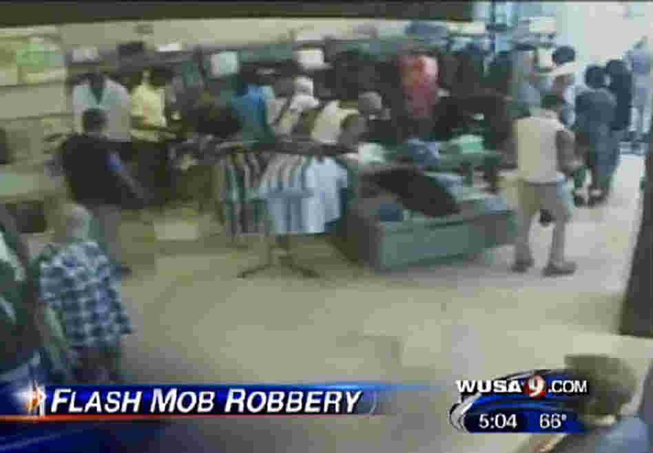 An image from a security camera at a clothing store in Washington, D.C., shows a flash mob robbery in April. Thousands of dollars' worth of merchandise was stolen, police said. An image from a security camera at a clothing store in Washington, D.C., shows a flash mob robbery in April. Thousands of dollars' worth of merchandise was stolen, police said.