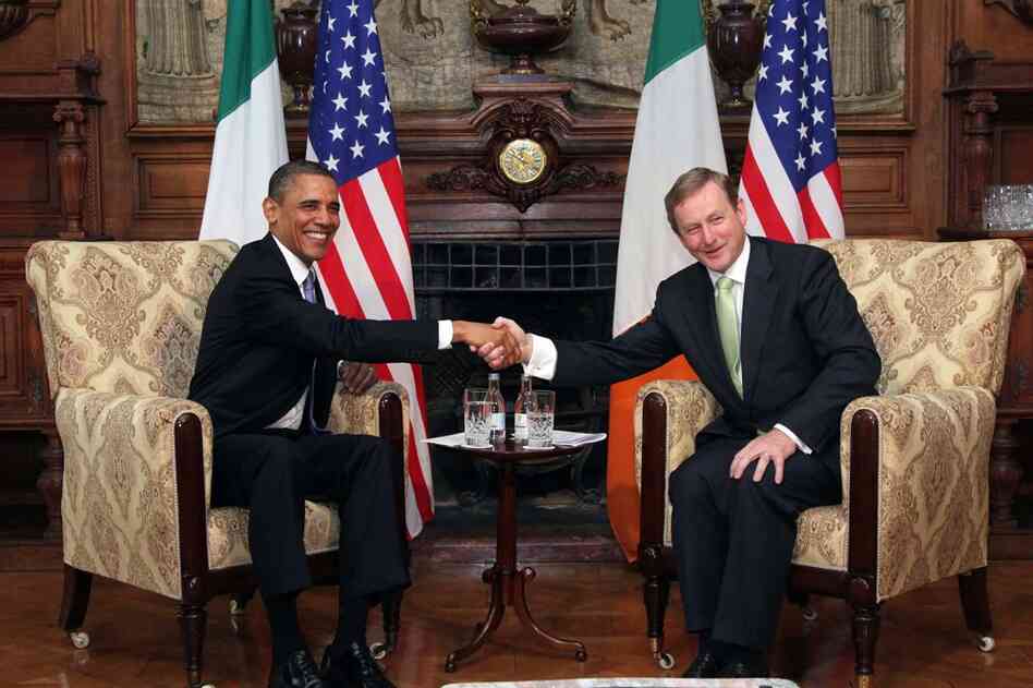 Obama and Prime Minister Enda Kenny shake hands during talks at Farmleigh. 