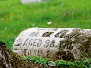 This 1800s tombstone of an ex-slave shows wear. Several organizations are fighting to reclaim African-American burial grounds that has been exhumed or turned into parking lots. This 1800s tombstone of an ex-slave shows wear. Several organizations are fighting to reclaim African-American burial grounds that has been exhumed or turned into parking lots.