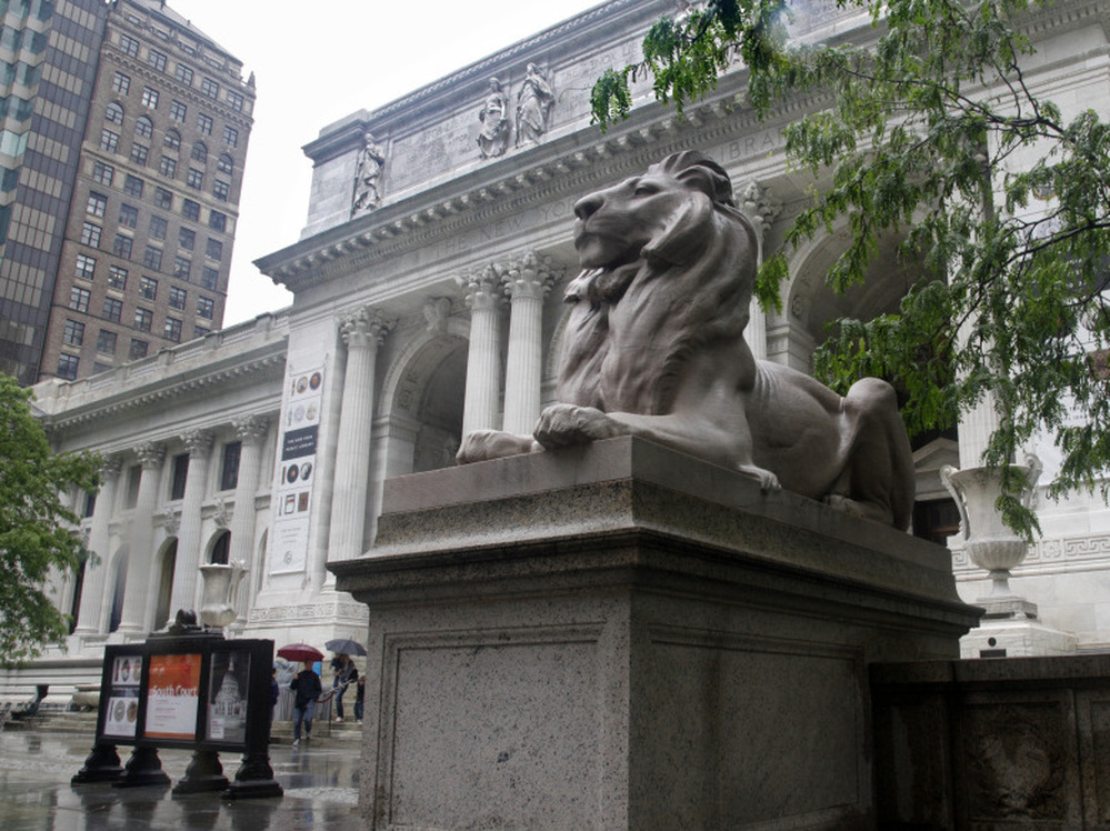 The marble lion "Fortitude," one of a pair created by Edward Clark Potter in 1911, is seen at the main entrance to the New York Public Library on May 20.