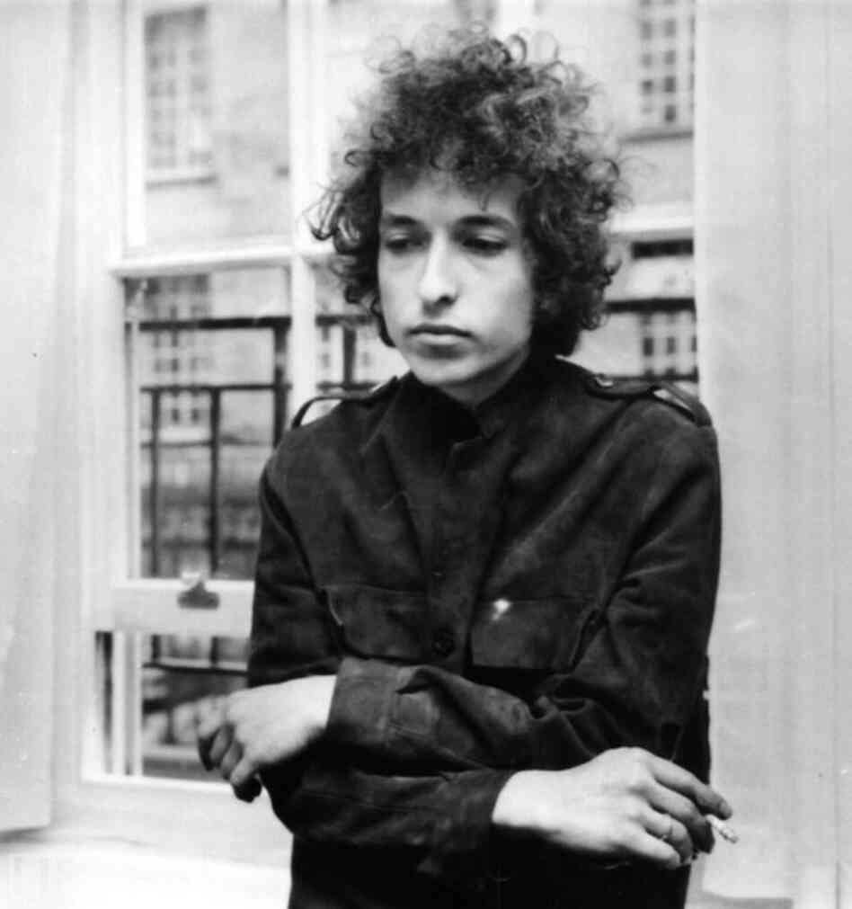 Dylan at a London press conference. The previous summer, his first electric concert — at the Newport Folk Festival — prompted boos from the audience, and he left the stage after only three songs. 