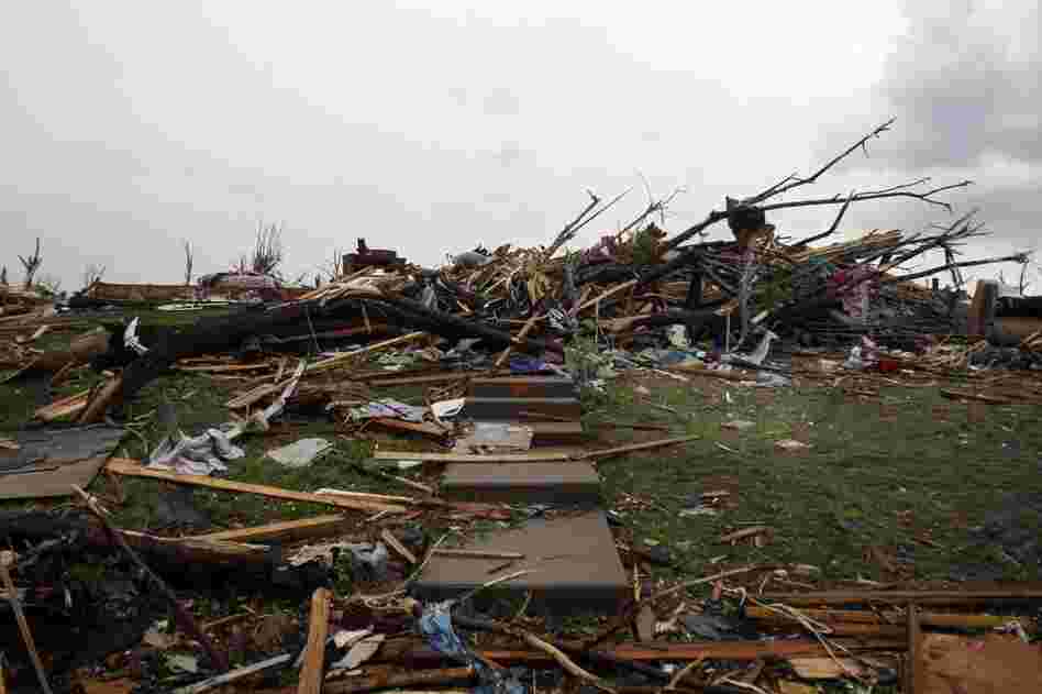 Stairs lead to rubble where a home once stood. 