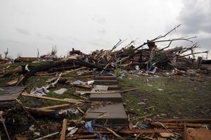 Stairs lead to rubble where a home once stood.