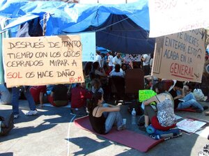 An urban encampment has sprung up in Madrid's central square, Puerta del Sol. The sit-in, which started a week ago, has rapidly grown in size.