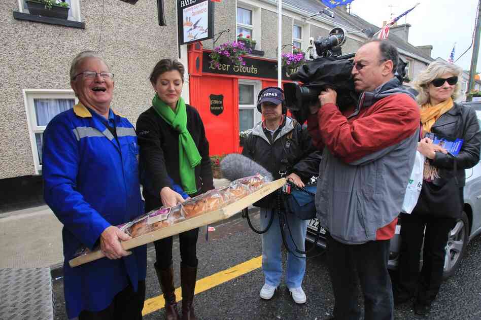 Moneygall resident Joseph Kearney is filmed by the Today show as he delivers Obama-themed brack bread. 