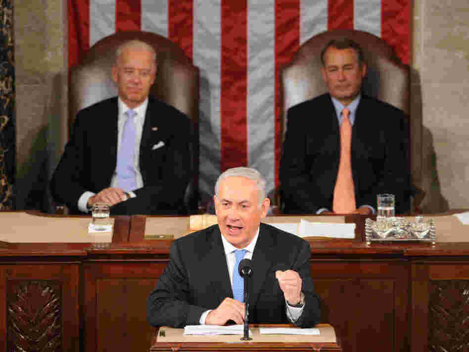 Vice President Joe Biden and House Speaker John Boehner watch as Israeli Prime Minister Benjamin Netanyahu addresses lawmakers at the Capitol on Tuesday.