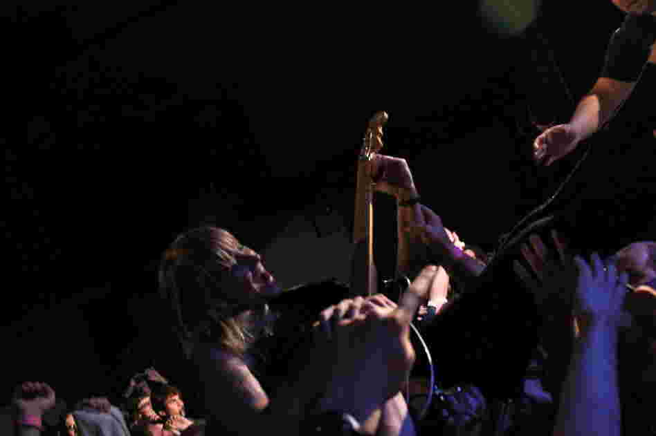 Wye Oak's Jenn Wasner tumbles into the crowd during the closing all-star Nirvana jam. 