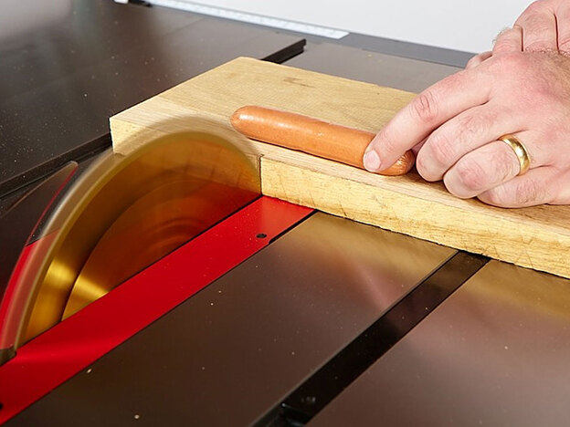 The SawStop senses an electrical current in the hot dog.