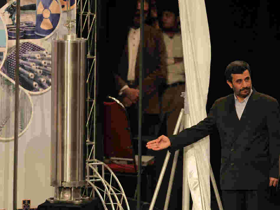 Iranian President Mahmoud Ahmadinejad unveils a sample of the third generation centrifuge for uranium enrichment during a ceremony to mark the National Nuclear Day day in Tehran on April 9, 2010. A report from the International Atomic Energy Agency says production of low enriched uranium at Iran's Natanz facility is on the rise.
