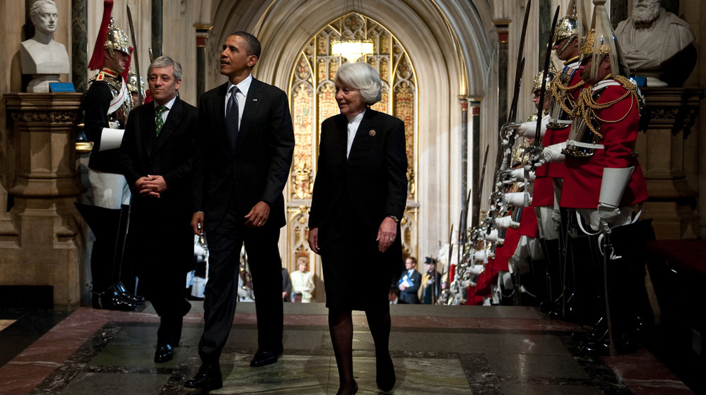 President Obama, accompanied by Commons Speaker John Bercow and Lords Speaker Baroness Helen Hayman, as he entered Westminster Hall.