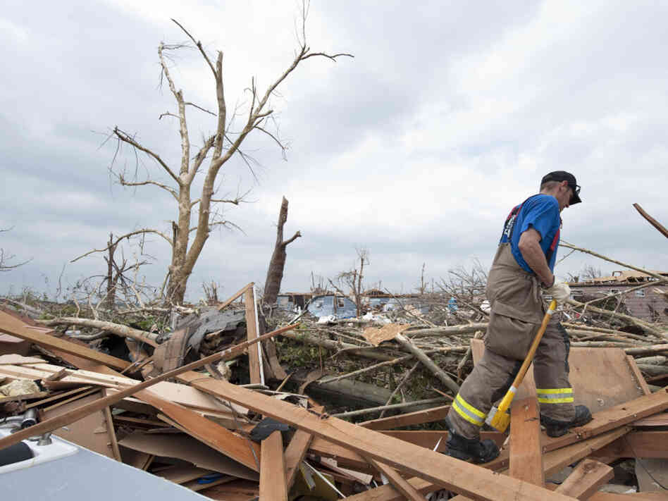 Jason Martin of the Carthage Fire Department made his way through debris during a search and rescue mission Tuesday (May 24, 2011) in Joplin.