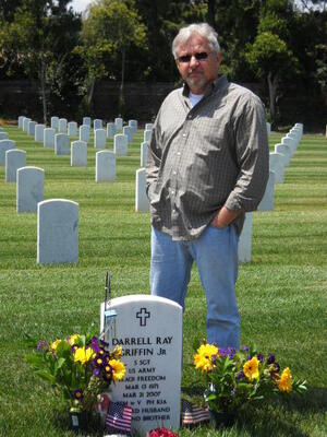 Darrell Griffin Sr. visits his son grave twice a month. The ritual is always the same: He lights two sticks of his son's favorite incense and adds a fresh bouquet of sunflowers. Darrell Griffin Sr. visits his son grave twice a month. The ritual is always the same: He lights two sticks of his son's favorite incense and adds a fresh bouquet of sunflowers.