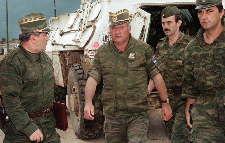Gen. Ratko Mladic (center), commander of the Serbian forces in Bosnia, arrives at Sarajevo's airport Aug. 10, 1993.