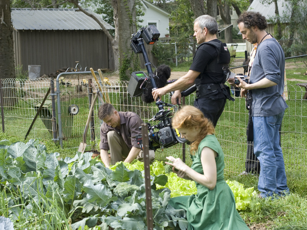 Filmmakers use hand-held cameras to capture the scenes of Terrence Malick's The Tree of Life, starring Brad Pitt and Jessica Chastain.