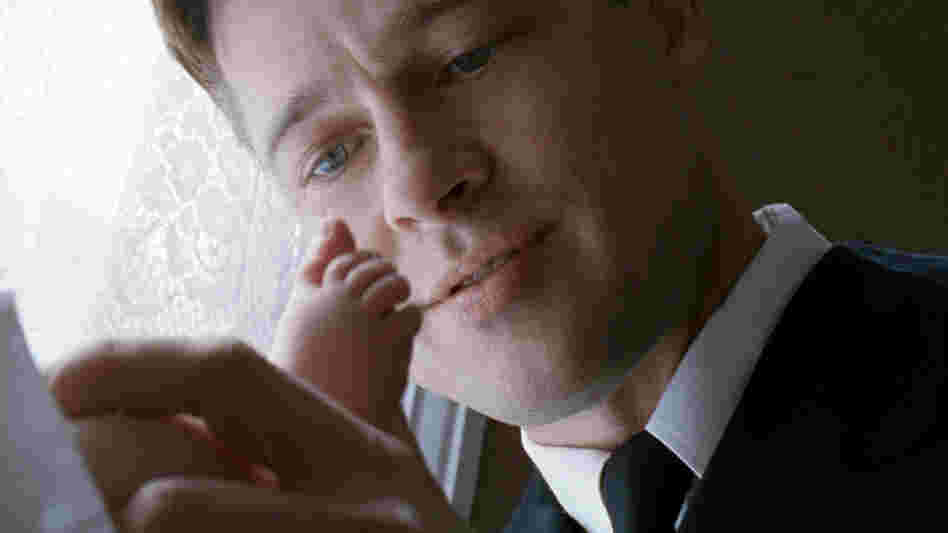 Brad Pitt plays Mr.O'Brien, an archetypal 1950s patriarch who loves his family and can't help but imposes huge expectations on them.