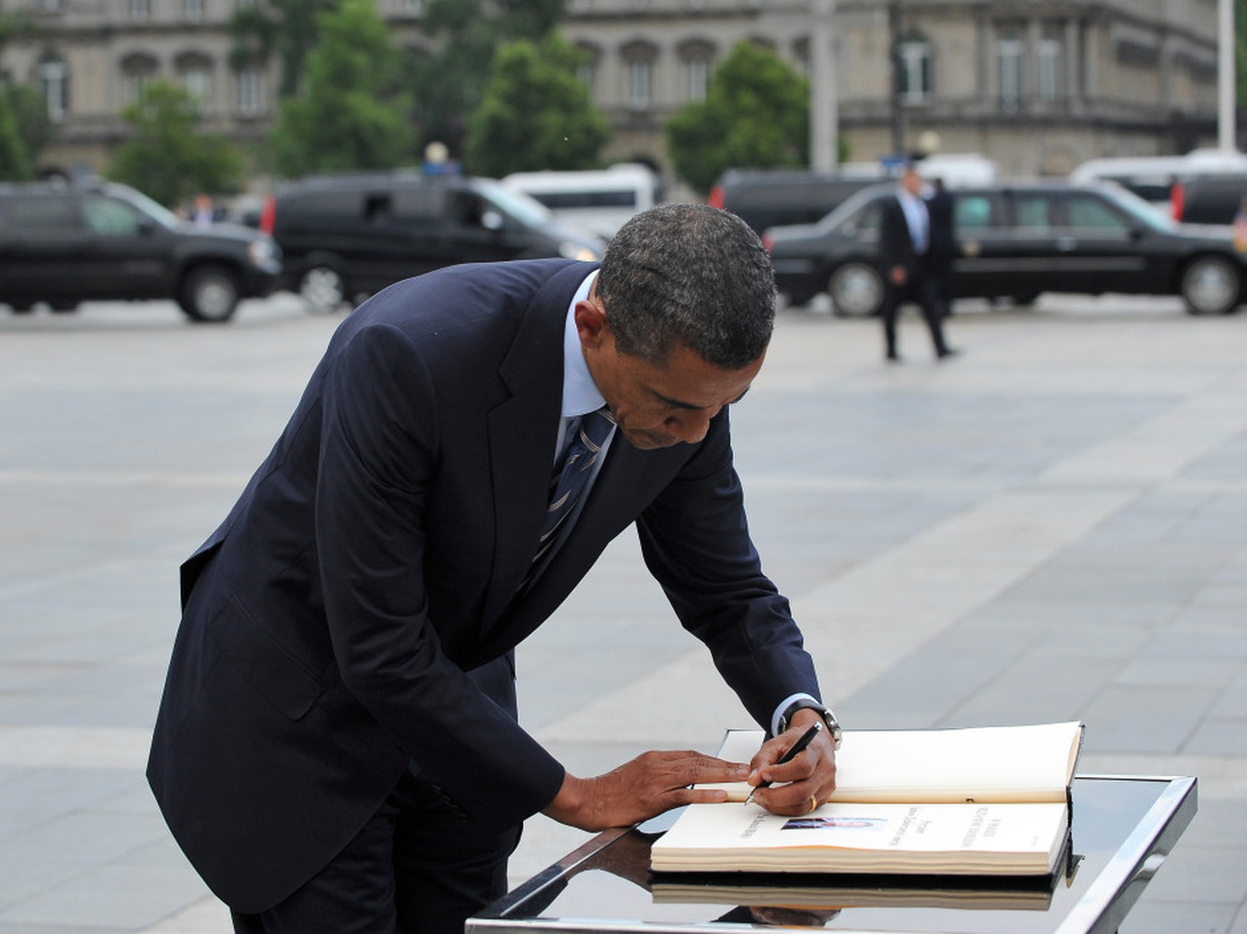 With his real hand in Europe, President Obama authorized the use of an autopen to sign into law the Patriot Act extension.