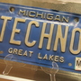 A Michigan license plate on exhibit at the techno museum run by Submerge and housed in the label's building. A Michigan license plate on exhibit at the techno museum run by Submerge and housed in the label's building.