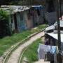 Barrio La Victoria Ciudad Delgado in San Salvador, El Salvador, is controlled by the Mara Salvatrucha gang. A gang leader says he sees the group as a social organization — one that provides services, like water, and protects "civilians." Barrio La Victoria Ciudad Delgado in San Salvador, El Salvador, is controlled by the Mara Salvatrucha gang. A gang leader says he sees the group as a social organization — one that provides services, like water, and protects "civilians."