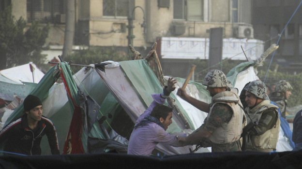 Egyptian Army soldiers forcibly removed protesters from Cairo's Tahrir Square on March 9. Some youths were camping out at the square to press their demand for a complete break with the ousted regime of Hosni Mubarak.
