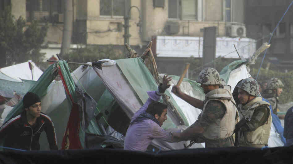 Egyptian Army soldiers forcibly removed protesters from Cairo's Tahrir Square on March 9. Some youths were camping out at the square to press their demand for a complete break with the ousted regime of Hosni Mubarak.
