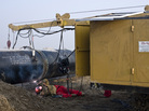 A worker welds at the China-Kazakhstan pipeline junction in Xinjiang, China, in 2008. A worker welds at the China-Kazakhstan pipeline junction in Xinjiang, China, in 2008.