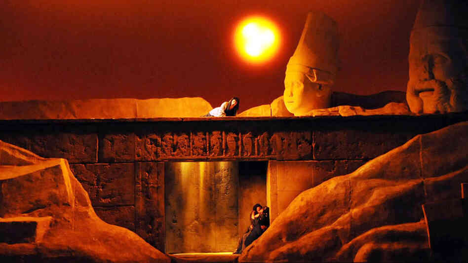 The fates of Aida and Radames are sealed in their tomb, as Amneris sings a prayer from above. The fates of Aida and Radames are sealed in their tomb, as Amneris sings a prayer from above.