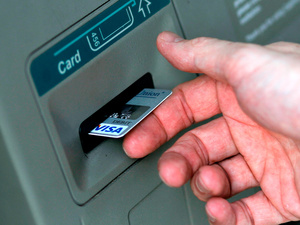 A man puts a card into an ATM in North Carolina last year. A recent study found that nearly a third of American consumers have reported credit card fraud in the past five years. A man puts a card into an ATM in North Carolina last year. A recent study found that nearly a third of American consumers have reported credit card fraud in the past five years.