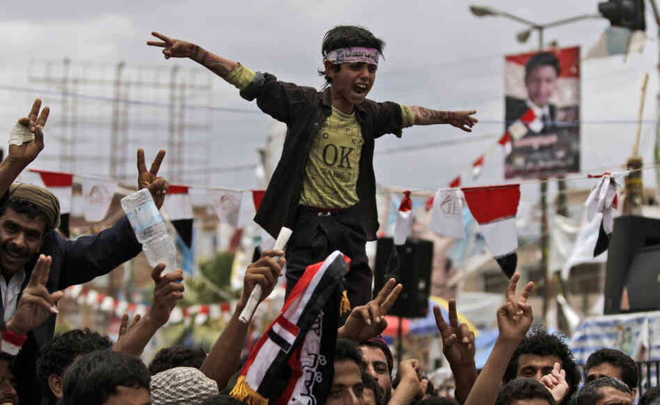 Anti-government protestors shout slogans during a demonstration demanding the resignation of Yemeni President Ali Abdullah Saleh, in Sanaa, Yemen on Thursday.