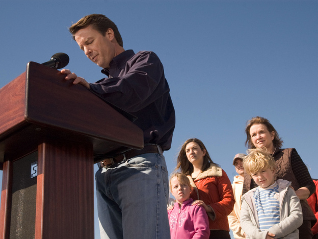 John Edwards exits the 2008 presidential race as his family watches, Jan. 30, 2008.