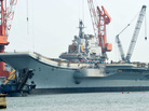 The Varyag aircraft carrier, shown April 26, is being renovated at a shipyard in the northern Chinese city of Dalian. After years of refurbishing work, the carrier — bought from Ukraine — has been described as "on the verge of setting out" by Xinhua state news agency. The Varyag aircraft carrier, shown April 26, is being renovated at a shipyard in the northern Chinese city of Dalian. After years of refurbishing work, the carrier — bought from Ukraine — has been described as "on the verge of setting out" by Xinhua state news agency.